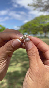 Video of a woman's hand wearing a Pearls in Bloom Plumeria Lavender Freshwater Pearl Ring in Two Tone Gold with Diamond - Maui Divers Jewelry