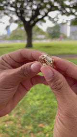Video of a woman's hand with a Hawaiian Gardens Monstera & Heliconia Ring in Tri Color Gold - 8mm - Maui Divers Jewelry