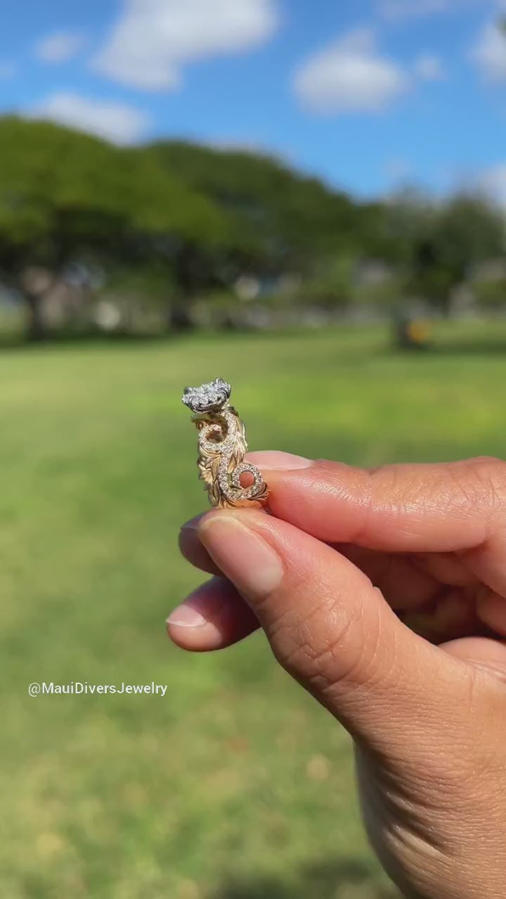 Video of a woman's hand with a Hawaiian Heirloom Engagement Ring in two tone Gold with Diamonds - Maui Divers Jewelry