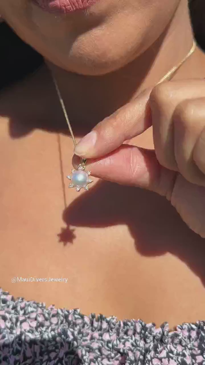 Video of a woman showing a Protea Akoya Pearl Pendant in Gold with Diamonds - Maui Divers Jewelry