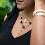 Nalu Black Coral Pendant in Gold - 22mm on Model