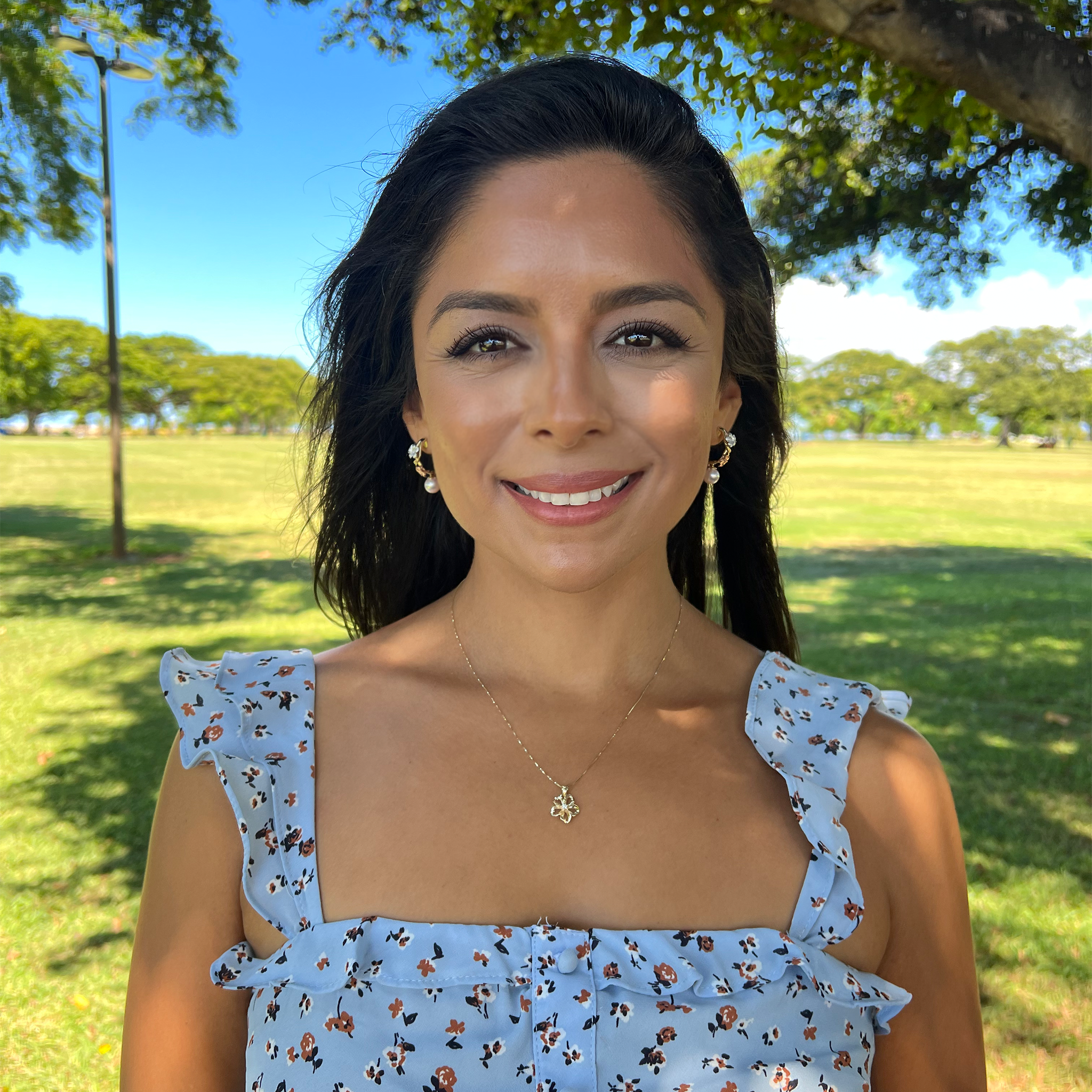 A woman wearing Pearls in Bloom Plumeria Akoya White Pearl Earrings in Tri color Gold with Diamonds - Maui Divers Jewelry