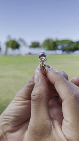 Video of a woman's hand wearing a Pearls in Bloom Plumeria Lavender Freshwater Pearl Ring in Tri Color Gold with Diamonds - 8mm - Maui Divers Jewelry