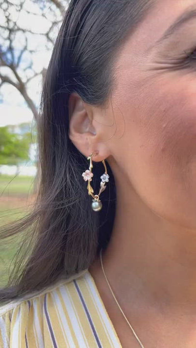 Video of a woman wearing Pearls in Bloom Plumeria Tahitian Black Pearl Earrings in Tri Color with Diamonds - 33mm - Maui Divers Jewelry