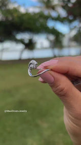 Video product of a woman's hand wearing a Nalu Ring in White Gold with Diamonds - 15mm-Maui Divers Jewelry