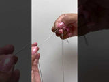Video of a woman showing how to adjust a 1.0mm Espiga Chain in White Gol - Maui Divers Jewelry
