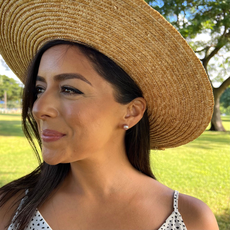 A woman wearing Lilac Freshwater Pearl (9-10mm) Earrings in Gold-Maui Divers Jewelry